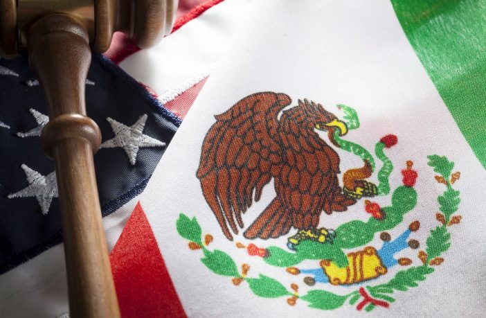 United States and Mexico flags with gavel